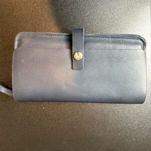 Navy handmade leather wallet.  I think it is an early Able wallet.  Excellent.
